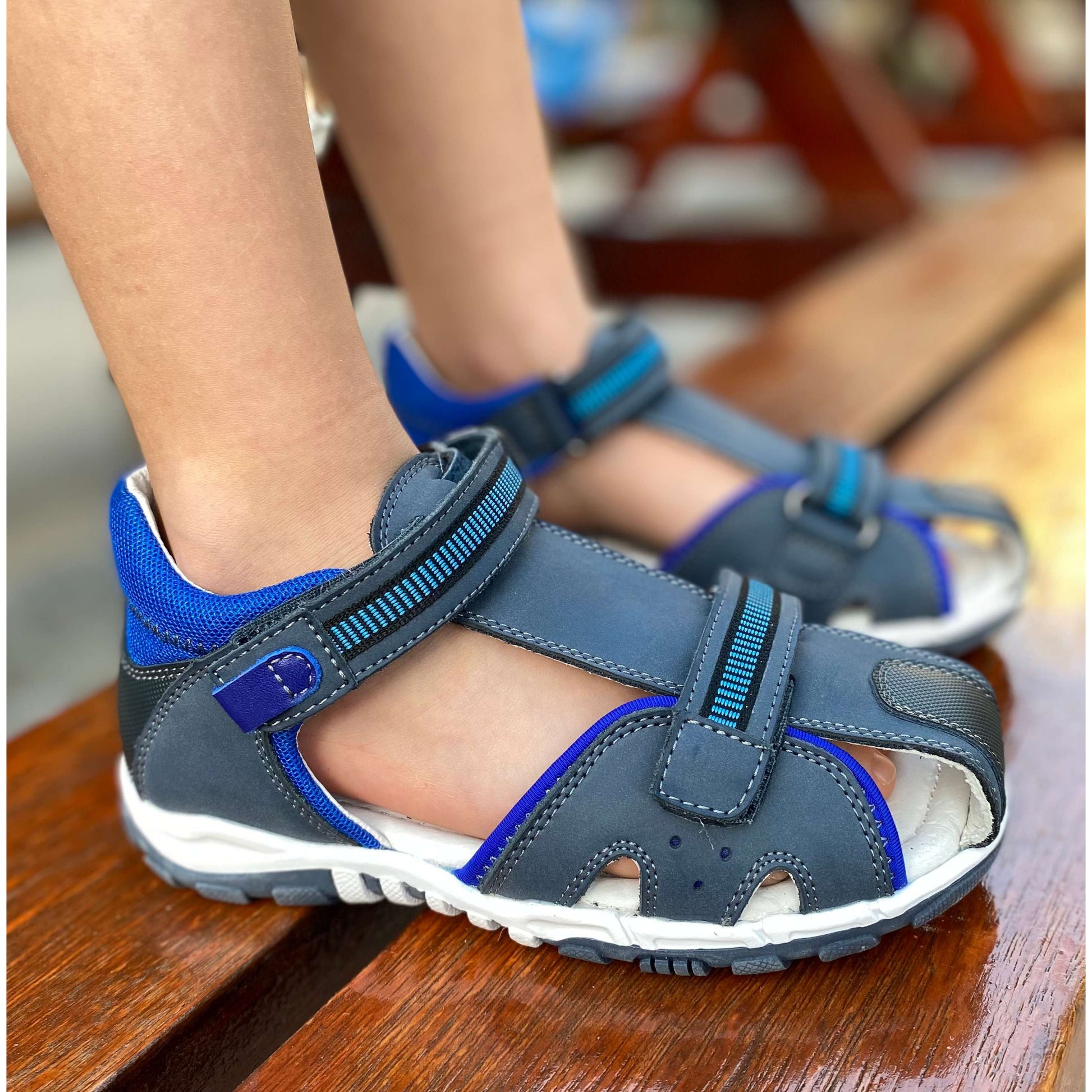 Orthotic, flexible, leather sandals for big boys