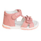 A pink toddler girl Protetika sandal with a hook-and-loop strap closure and a decorative bow detail in the front.