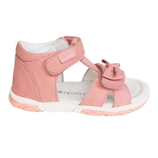 A pink toddler girl Protetika sandal with a hook-and-loop strap closure and a decorative bow detail in the front.