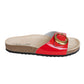 A red patent leather slide orthopedic  sandal with a gold-tone circular buckle and a cork sole by Protetika.
