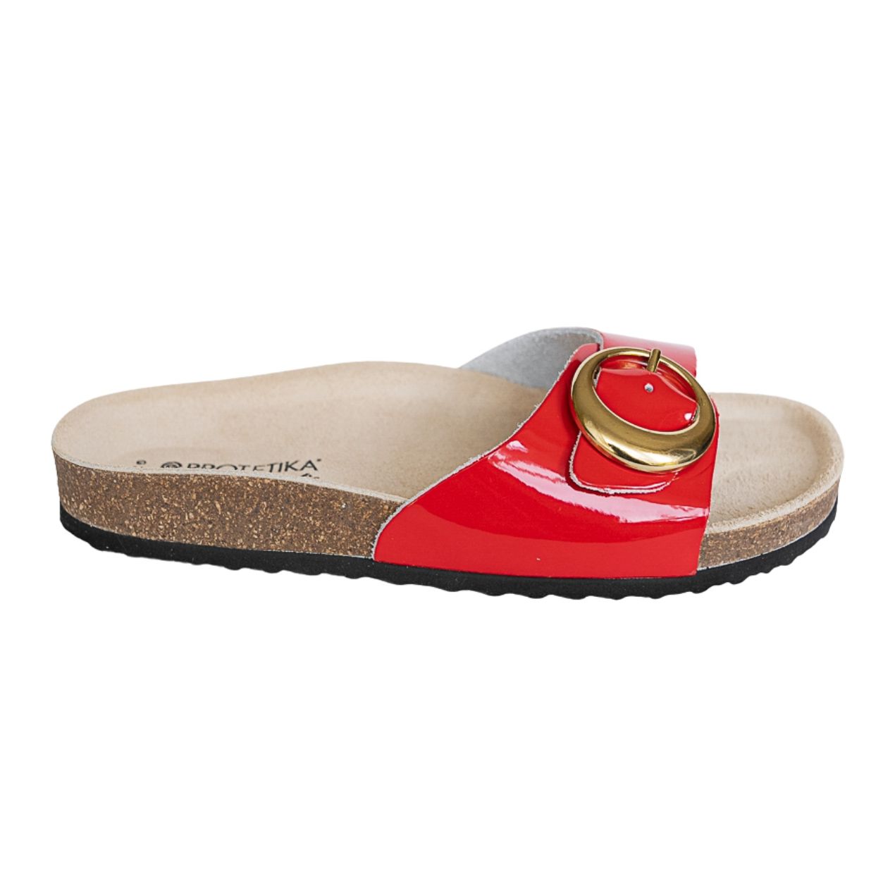 A red patent leather slide orthopedic  sandal with a gold-tone circular buckle and a cork sole by Protetika.