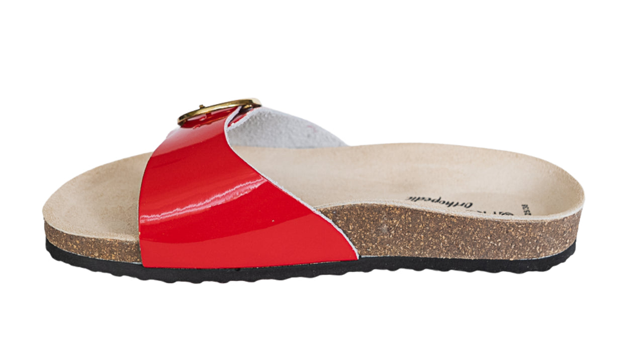 A glossy red  leather slide orthopedic  sandal with a high arch and metatarsal foot support and deep heel cup.