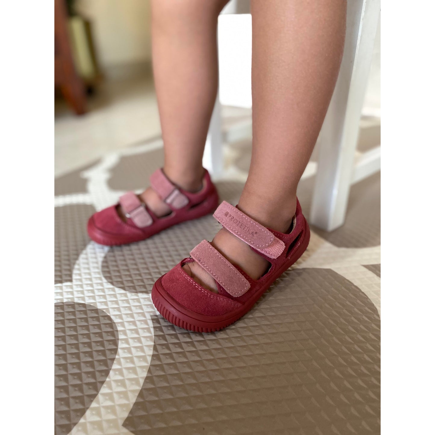 Barefoot sneakers BERG coral from Protetika are a perfect match for any of our girls outfits.