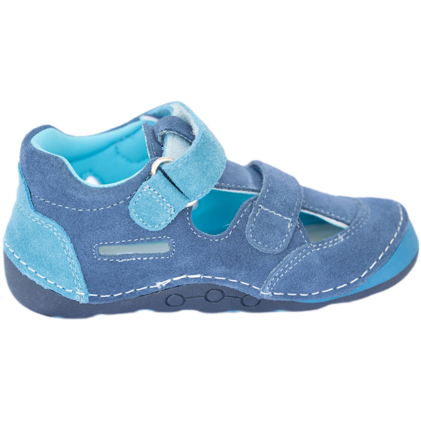 Minimalist barefoot sneakers for toddler boys are comfortable genuine leather shoes suitable for active boys, who run a lot on natural surfaces.