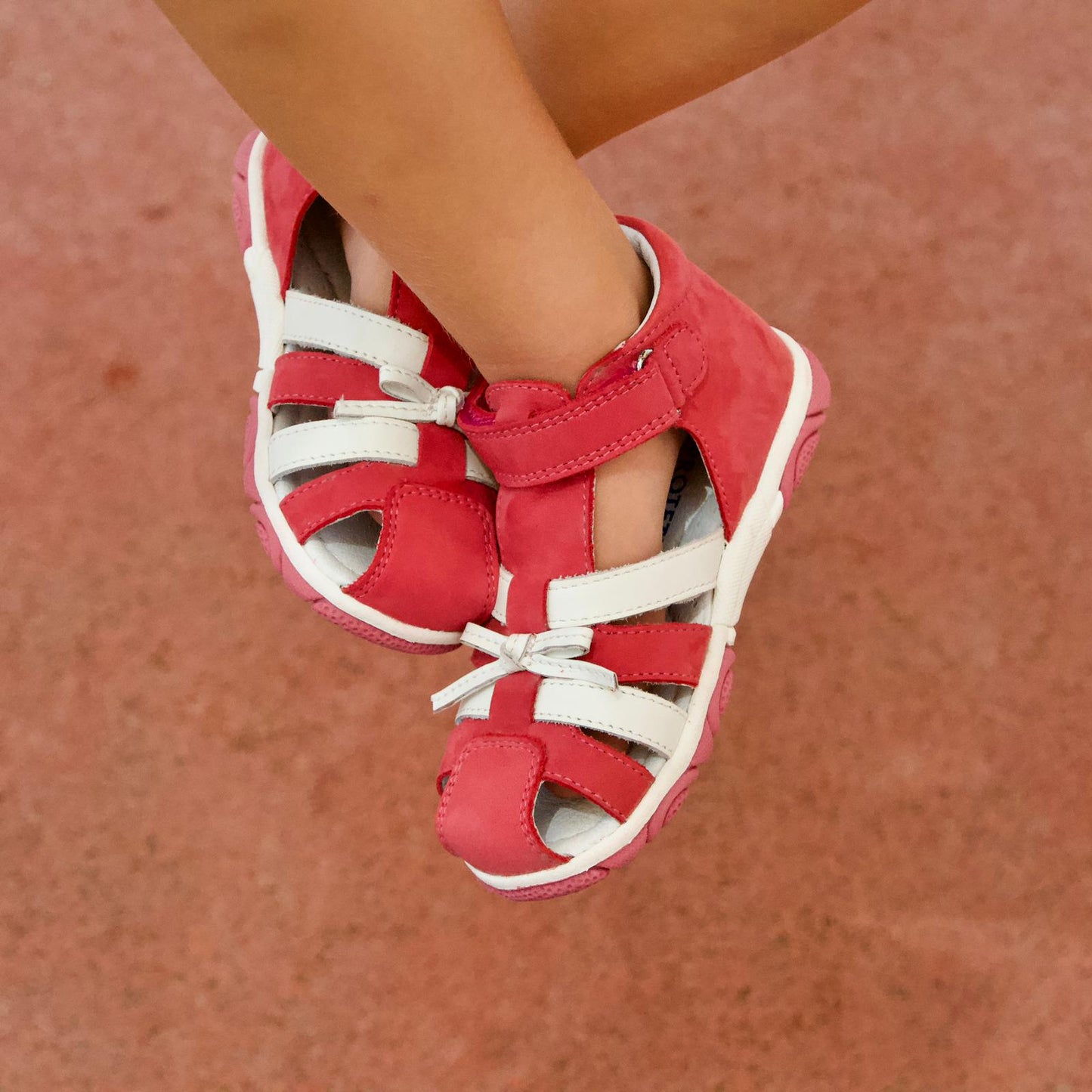 Girly red and white sandals for toddler girls, which match every outfit. Suede leather, arch support and a supportive heel counter.